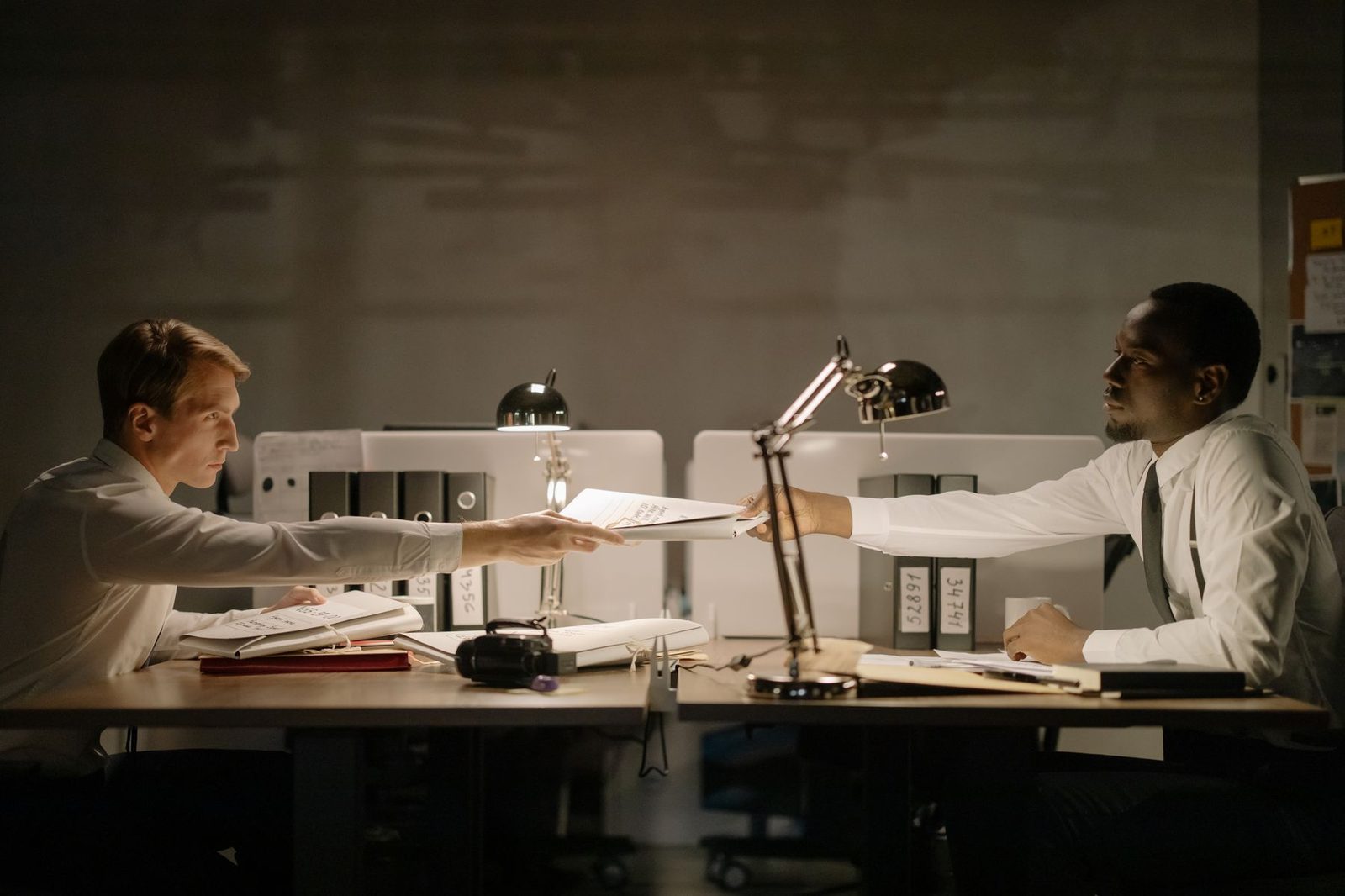 Analyst researching a supply market on screen