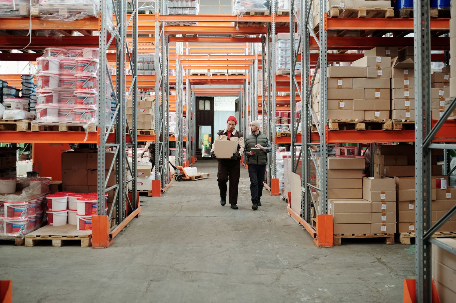 Supply chain and procurement team working across shared desks